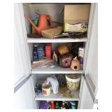 Contents of cabinet to include gardening supplies