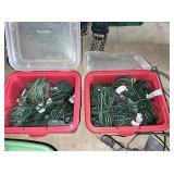 Storage totes full of outdoor extension cords