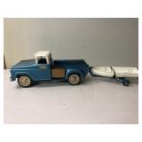 Vintage metal Tonka truck with boat