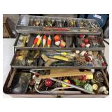 Metal tackle box full of supplies