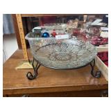 Glass bowl with wrought iron stand