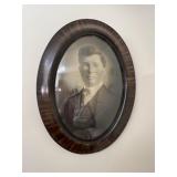 Framed oval portrait
