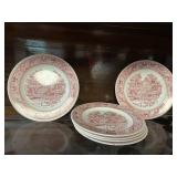 Six red transfer ware plates