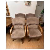 4 rolling upholstered chairs