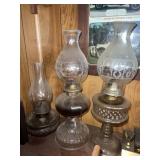 Three oil lamps