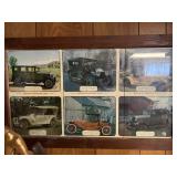 Framed artwork of antique cars