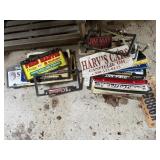 Corkboard of license plate covers