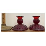 Pair of red candleholders