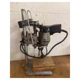 Drill press with drill