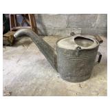 Galvanized watering jug