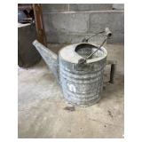 Galvanized watering jug