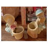 Pottery boy and girl planters