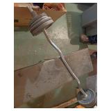 Curl bar with 60 pounds of weight