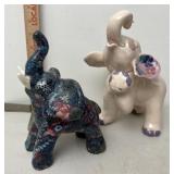 Pottery elephants have some damage