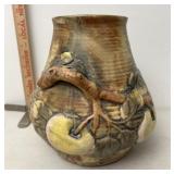 Roseville pottery vase has chip