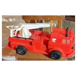 Plastic fire truck and highchair