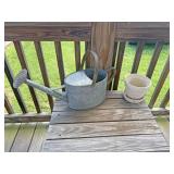 Watering can and flower pot