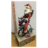 Santa on bicycle