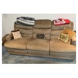 Brown couch and throw pillows