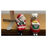 Shelf sitting Santa and Mrs. clause salt and