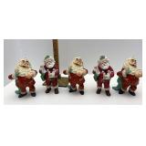 Five Santa ornaments