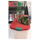 95 quart Rubbermaid tote with two Christmas items