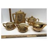 Gold McCoy pottery - kettle has chip