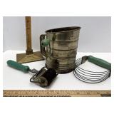 Green handled kitchen items