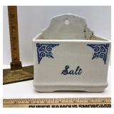 Pottery wall salt holder has crack