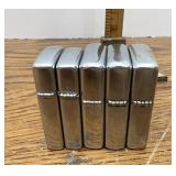 Five Zippo lighters