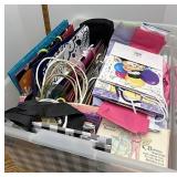 Tote full of gift bags and tissue paper