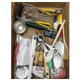 Assorted kitchen items including can opener