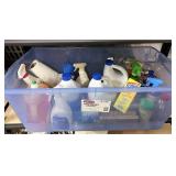 Tote full of cleaning supplies