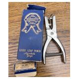 Blue ribbon loose leaf punch
