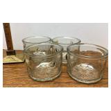 4 glass bowls M or W on bottom