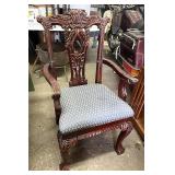 Call arm and foot carved chair