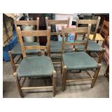 Five upholstered ladderback chairs