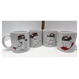 Set a four Santa bear mugs