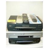 STACK OF VCRs AND REMOTES