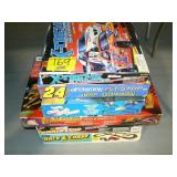 STACK OF GAMES AND ROAD RACE