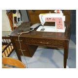 SINGER SEWING MACHINE AND CABINET