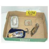 FLAT WITH CIGARETTE LIGHTERS AND POCKET KNIVES FLAT WITH CIGARETTE LIGHTERS AND POCKET KNIVES