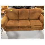BROWN UPHOLSTERED COUCH