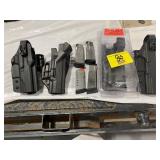 GROUP OF METAL GUN CLIPS, GUN HOLSTERS
