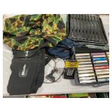 CASE OF CASSETTE TAPES, CAMO DUFFLE BAG, STACK OF