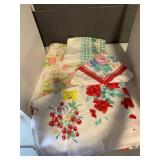 GROUP OF VINTAGE PATTERN TABLECLOTHS & MCM SHEET