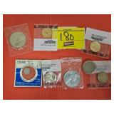 (2) SUSAN B ANTHONY COINS, (2) SACAGAWEA DOLLARS,