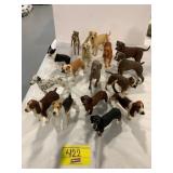LARGE GROUP OF RESIN DOGS OF ALL BREEDS