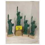 GROUP OF PLASTIC STATUE OF LIBERTY FIGURES
