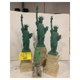 GROUP OF PLASTIC STATUE OF LIBERTY FIGURES